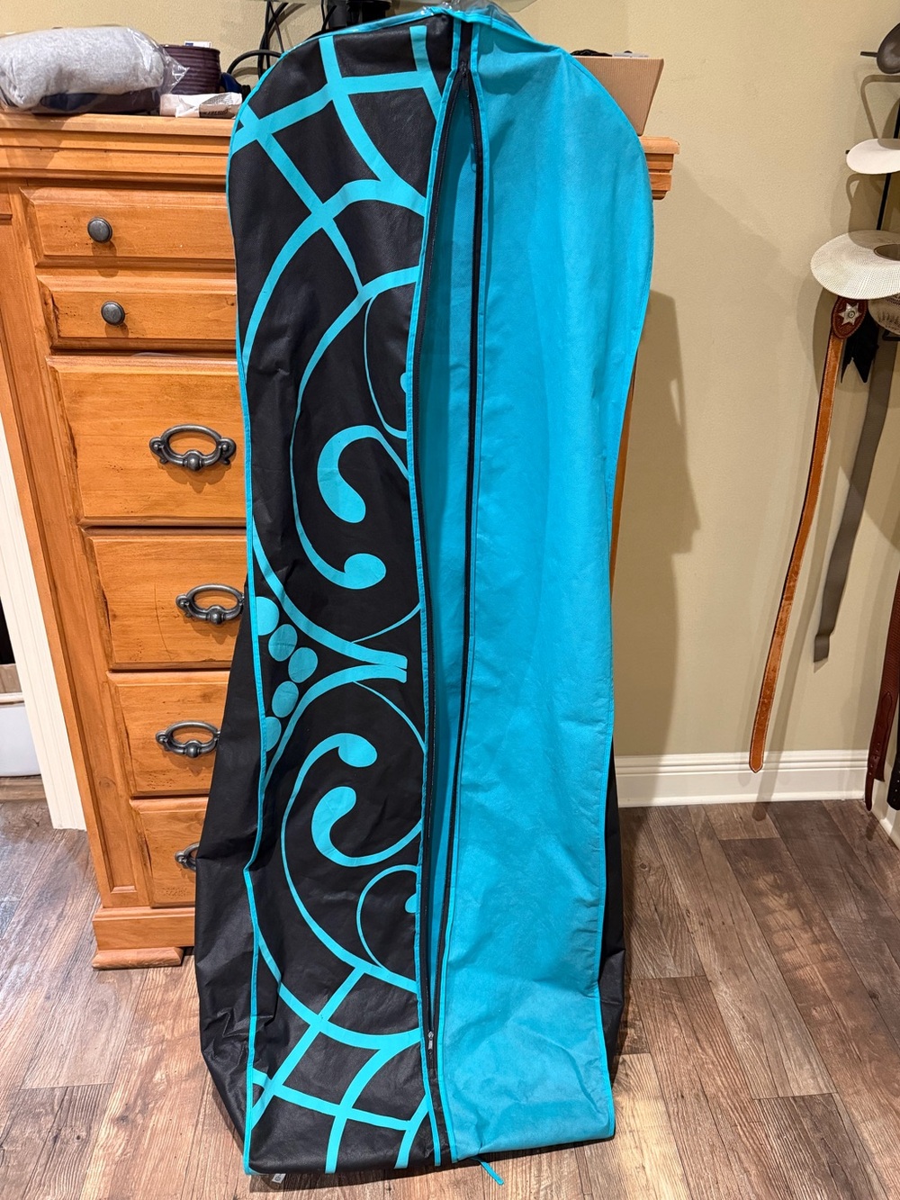 Large garment bag with blue and black design